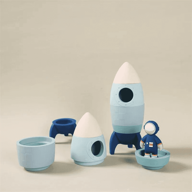 Brinquedo de Foguete Infantil Silicone - com Astronauta Azul | Bebê Colorido