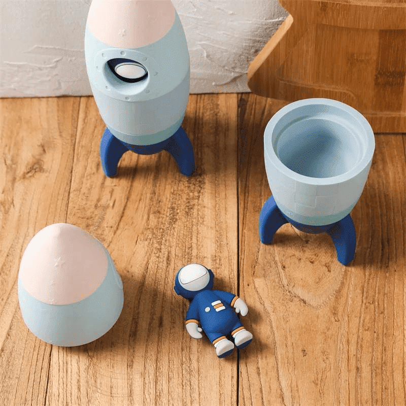 Brinquedo de Foguete Infantil Silicone - com Astronauta Azul | Bebê Colorido